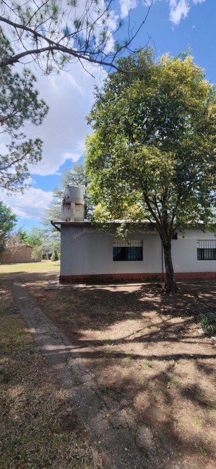 Venta casa 2 dormitorios lote esquina amplio parque 